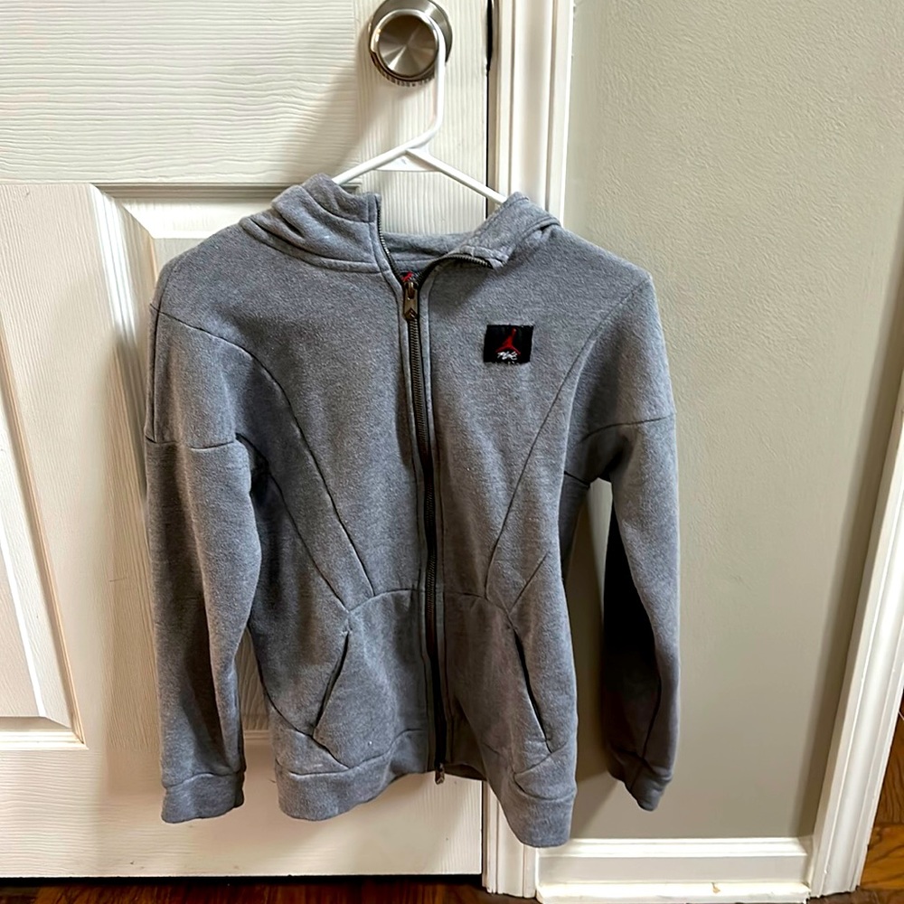 Air Jordan (Boys) full zip hoodie, size large.